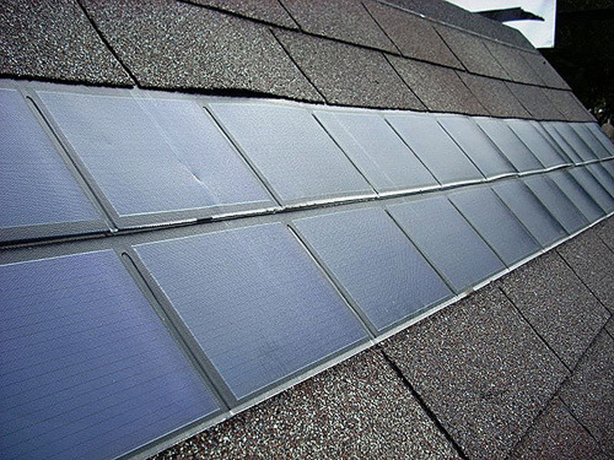 How to Save Home Energy Costs by Installing Solar Roof Shingles